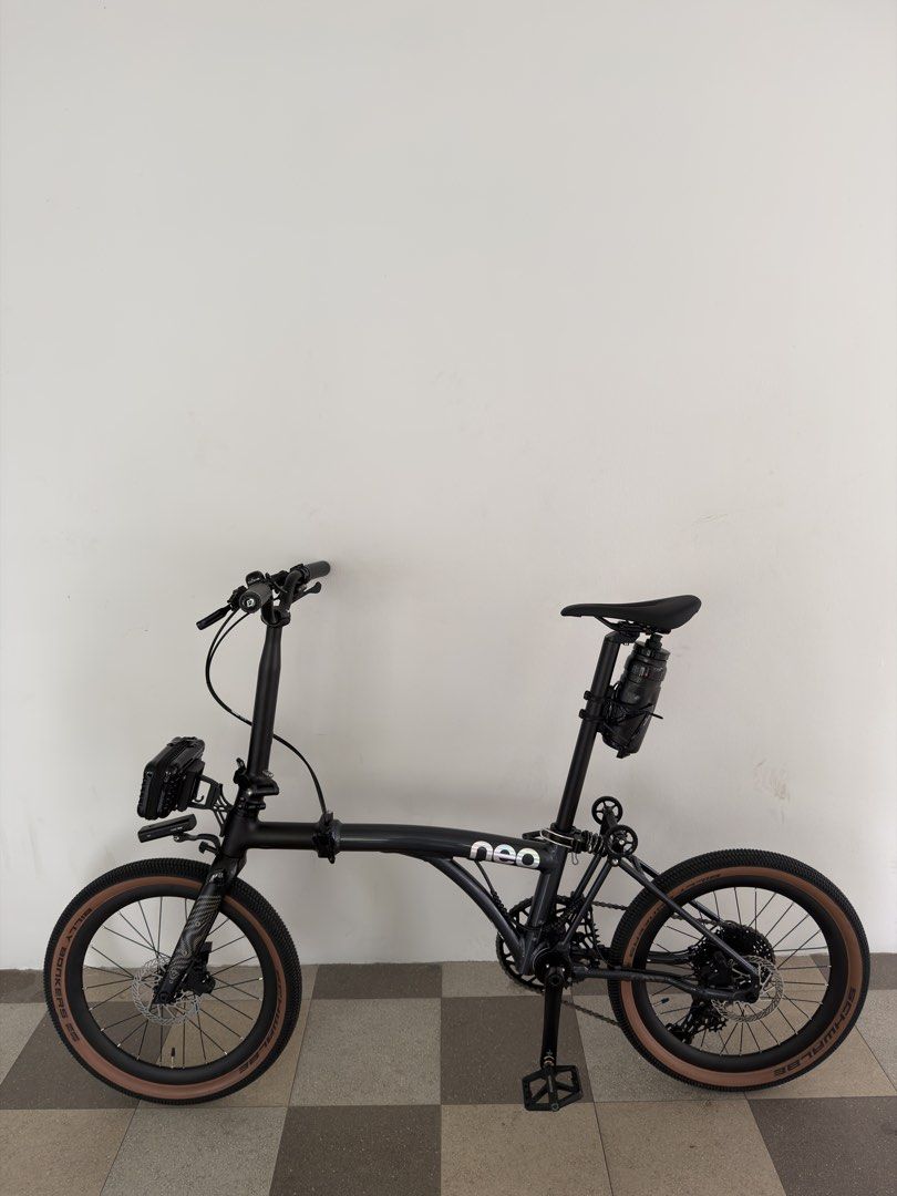 Java Neo 3 (Category: Bicycles) located in Singapore. Submitted by uchiha_monster (Listing ID 1468748190, Image 1). Description: - Model: Black Neo folding bike with carbon fork - Tires: Schwalbe Billy Bonkers - Accessories: Black water bottle holder on seat post and a small front pouch - Storage: Compact fold, easy to store and carry.