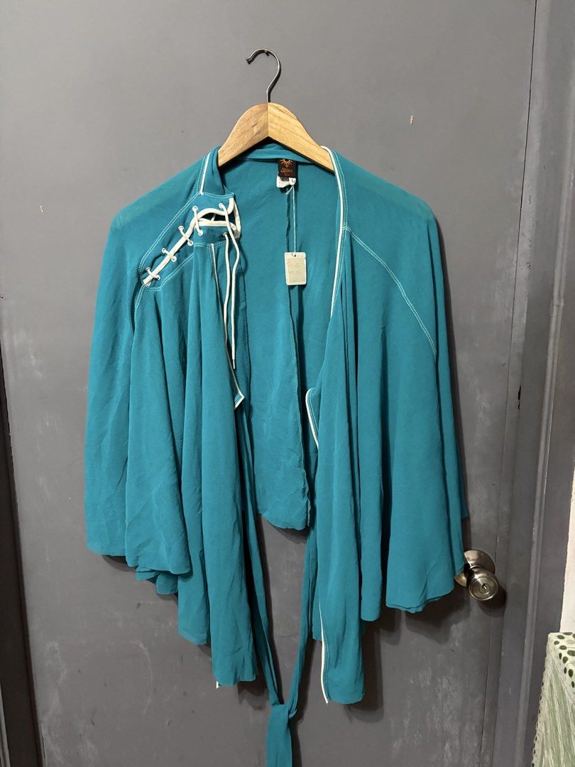 Jean Paul Gaultier Poncho (Category: Others Tops) located in Iloilo. Submitted by bygone.ph (Listing ID 1468855753, Image 1). Description: free size.