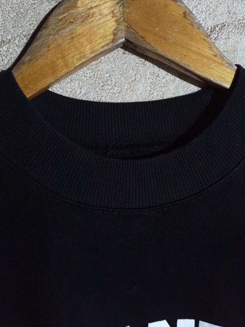 Jil Sander Black Logo T-Shirt (Category: Activewear) located in Caloocan City. Submitted by adonebarro03722 (Listing ID 1468805544, Image 2). Description: - Brand: Jil Sander - Color: Black with bold white chest logo - Material: 100% heavy cotton, Made in Italy - Features: Thick ribbed collar, relaxed short sleeves - Model Code: JSMP707020 MP248508 - Condition: Great streetwear staple, clean wash and solid construction - Dimensions:21x27.