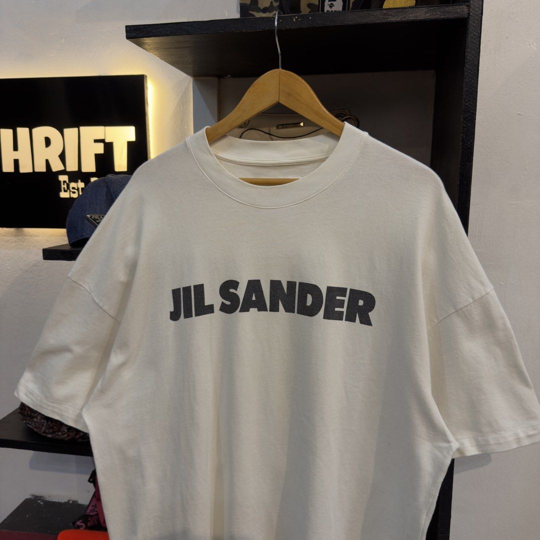 Jill Sander White Crewneck Shirt (Category: Tshirts & Polo Shirts ) located in Manila. Submitted by jerichomal82553 (Listing ID 1468908049, Image 2). Description: Jill Sander White Crewneck Shirt 24 by 29.5 Good Condition Complete Tags.