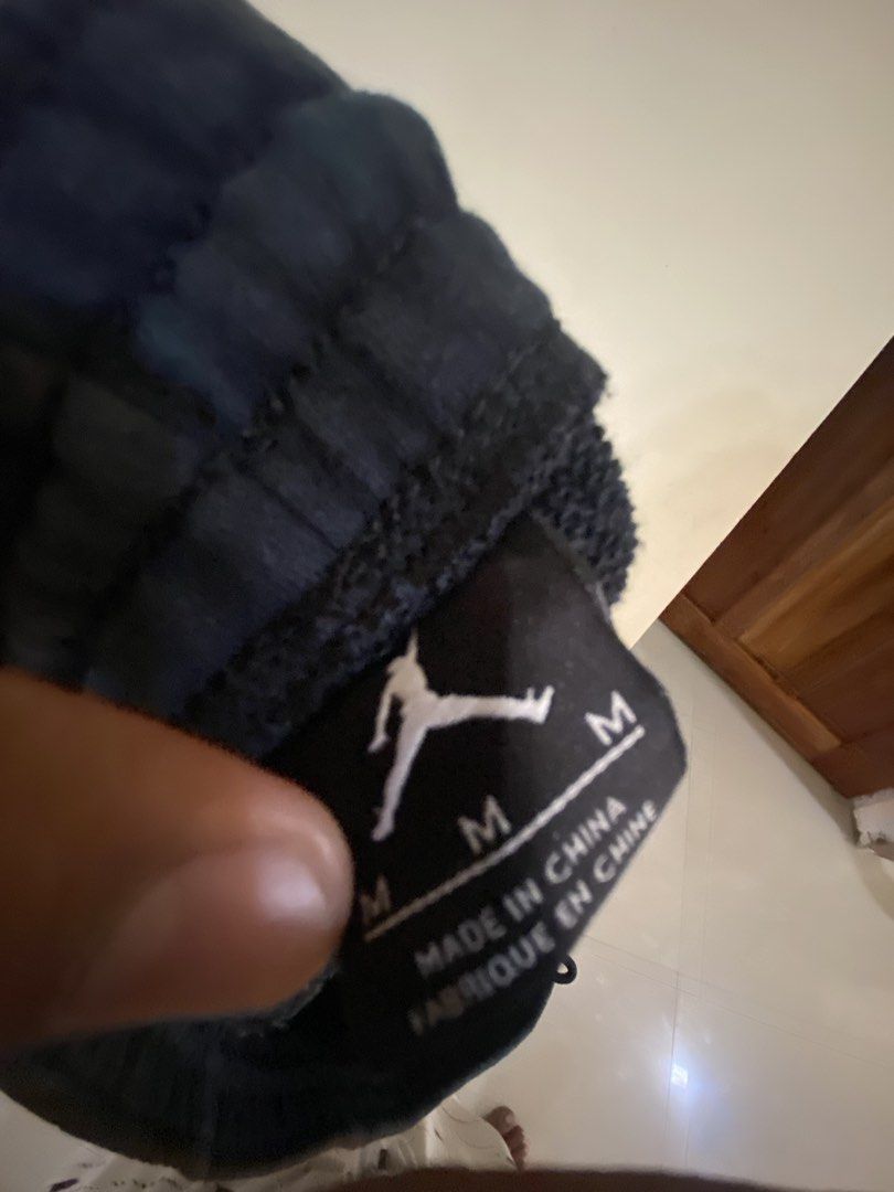 Jordan Black Shorts Men Size M (Category: Shorts) located in Vinzons. Submitted by gabrielvic (Listing ID 1468738796, Image 2). Description: - Brand: Jordan - Color: Black - Size: Medium - Features: Elastic waistband, convenient side pockets - Branding: White Jumpman logo on the left leg - Authenticity: Style code SU151002NIG, made in China - Condition: Clean fabric, no major flaws.