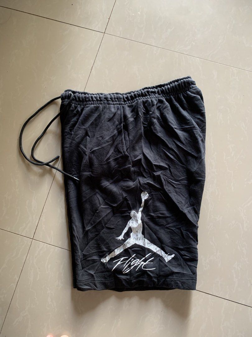 Jordan Flight Black Sweatshorts Size L (Category: Shorts) located in Manila. Submitted by luckycat-fd8b (Listing ID 1468927137, Image 1). Description: Jordan Flight fleece shorts in black. Large size. Drawstring waist with branded aglets and eyelets. Large distressed Jumpman logo and Flight script printed on the left leg. Body made of 80 percent cotton and 20 percent polyester, side pockets are 100 percent cotton. Made in Vietnam..