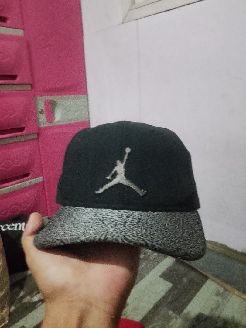 Jordan Jumpman Snapback Cap Black Grey Elephant Print (Category: Caps & Hats) located in Quezon City. Submitted by theoneshop1 (Listing ID 1468892434, Image 1). Description: - Color: Classic black with grey elephant print on the brim - Branding: Iconic embroidered Jumpman logo on the front and branded interior taped seams - Fit: Adjustable plastic strap at the back for a custom fit - Condition: Clean, well-maintained, and ready to wear.