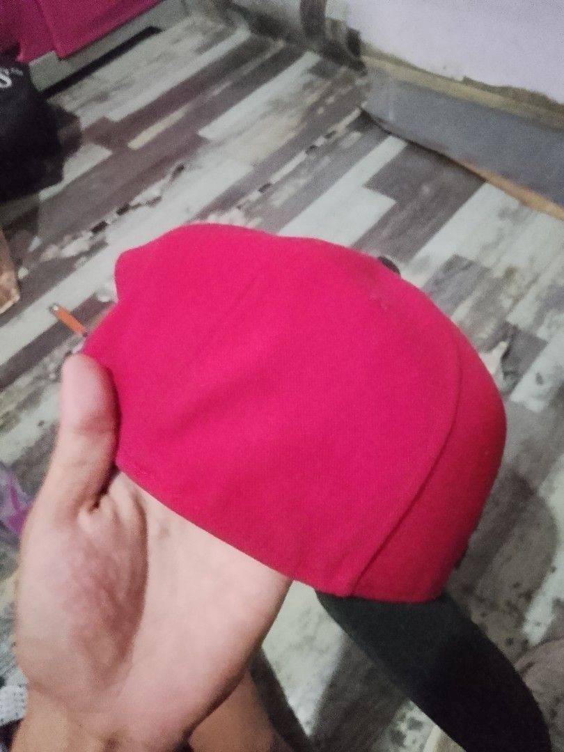 Jordan Jumpman Snapback Cap Red Black (Category: Caps & Hats) located in Quezon City. Submitted by theoneshop1 (Listing ID 1468892305, Image 3). Description: - Color: Red crown with a black flat brim - Branding: Embroidered Jumpman logo on the front and Jordan text on the snap - Fit: Adjustable plastic snap closure at the back - Details: Interior taped seams featuring 'Quality Inspired by the Greatest Player Ever' text - Material: 100% polyester 