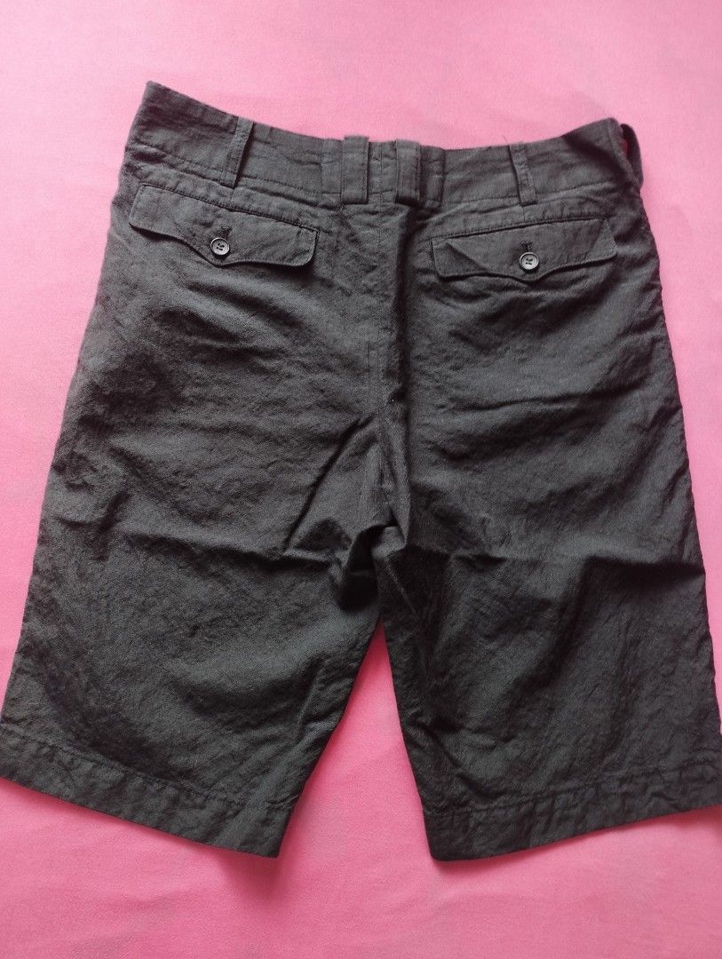 Junya Watanabe x CDG Japan (Category: Shorts) located in San Fernando. Submitted by nerosales (Listing ID 1468713654, Image 3). Description: Junya Watanabe x Comme des Garcons (CDG) Short Made in Japan Black fits up to 32 waist length - 21 inches hem - 9 inches minimal issue: may part na sumabit pero di butas. please see last photo. Yung horizontal fold ay sa pagkakatupi lang sa storage. Laba or plantsa lang flat na ulit. 1,850 pesos only SM City