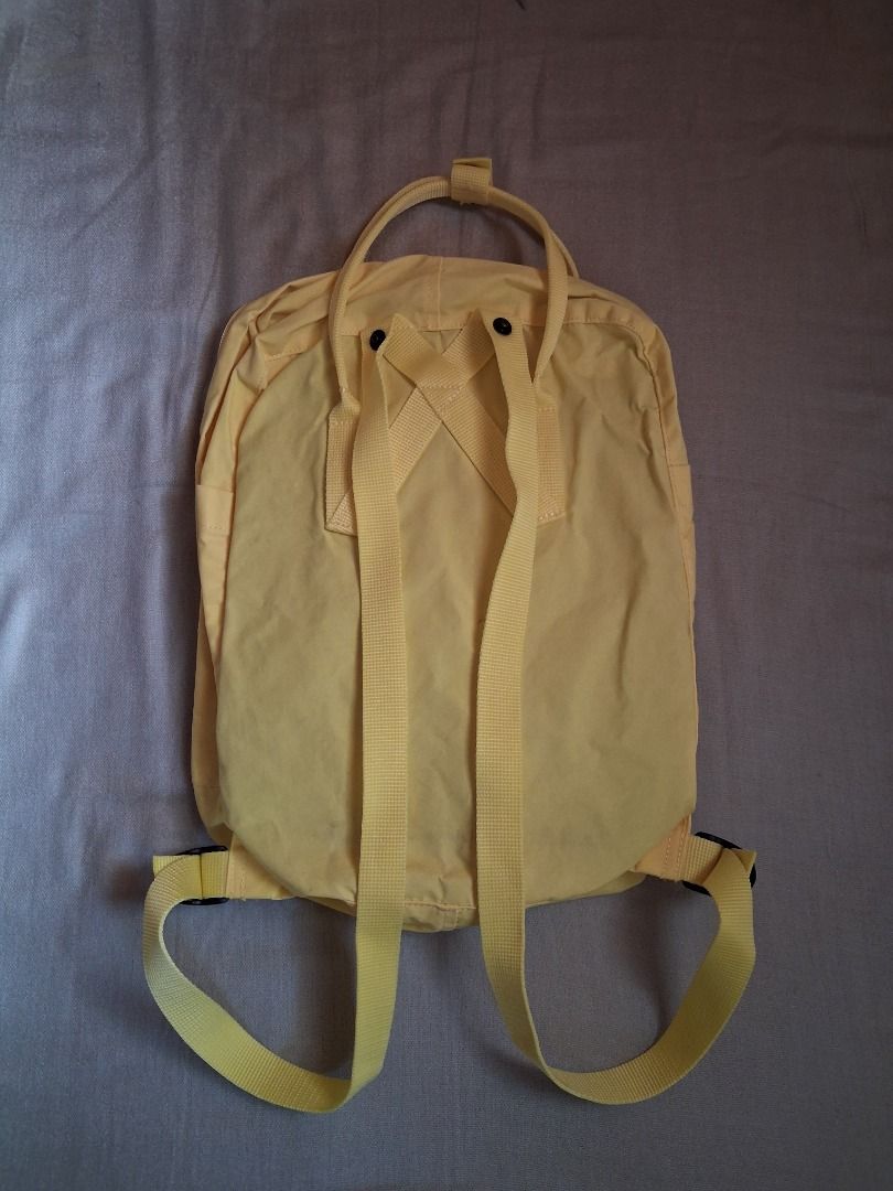Kanken classic backpack (Category: Backpacks) located in Quezon City. Submitted by threeleggeddog (Listing ID 1468844937, Image 2). Description: pre-loved 9/10 condition yellow color.