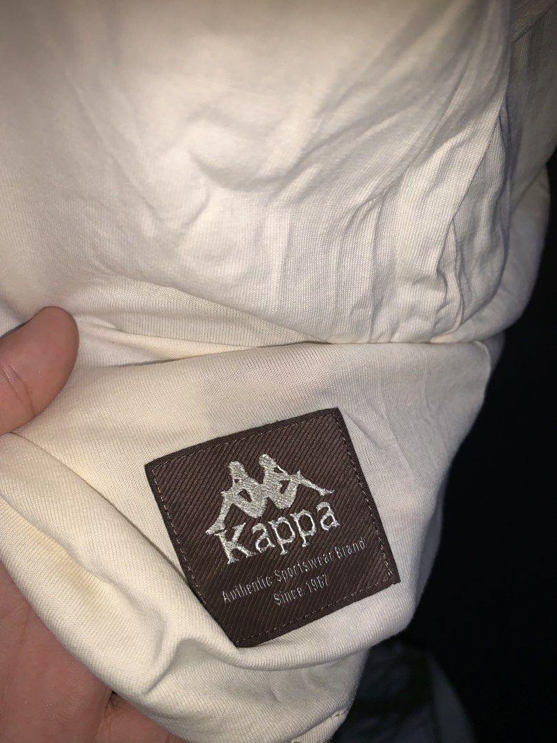 Kappa Authentic T-Shirt Cream Size M (Category: Tshirts & Polo Shirts ) located in Cardona. Submitted by rmlyn1998 (Listing ID 1468713968, Image 3). Description: - Brand: Kappa - Color: Cream - Size: EU 44 / CN M / JP M (fits like Medium) - Design: Small 'authentic' text on chest, large repeating 'authentic' graphics on the back - Details: Short sleeves, round neckline, woven Kappa logo tag near bottom hem - Condition: Brand new / Excellent - Mod