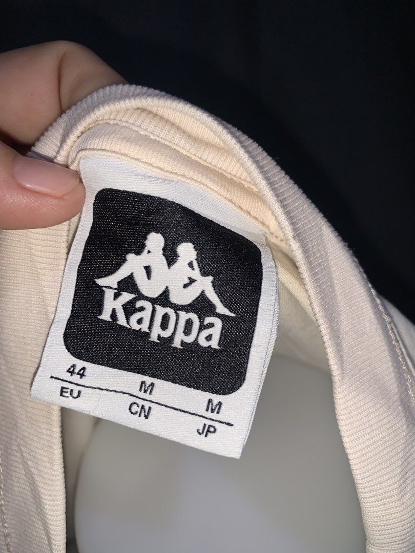 Kappa Authentic T-Shirt Cream Size M (Category: Tshirts & Polo Shirts ) located in Cardona. Submitted by rmlyn1998 (Listing ID 1468713968, Image 2). Description: - Brand: Kappa - Color: Cream - Size: EU 44 / CN M / JP M (fits like Medium) - Design: Small 'authentic' text on chest, large repeating 'authentic' graphics on the back - Details: Short sleeves, round neckline, woven Kappa logo tag near bottom hem - Condition: Brand new / Excellent - Mod