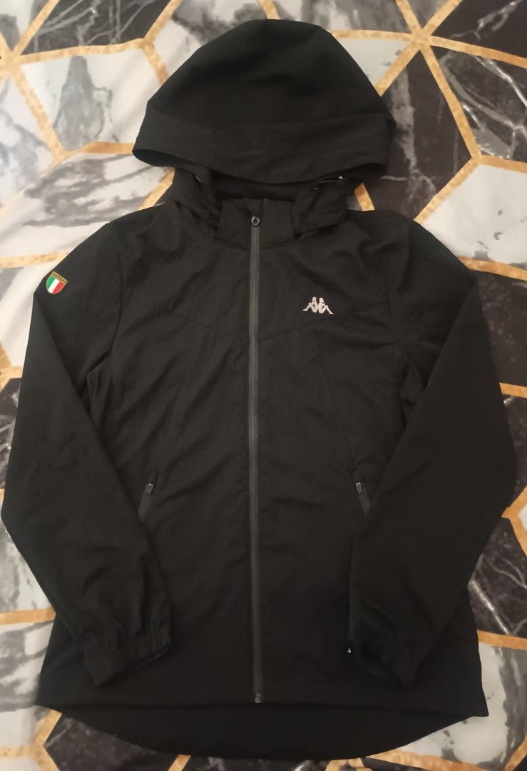 Kappa Windbreaker (Category: Coats, Jackets and Outerwear) located in Bacolod City. Submitted by jazzteeeyyynn (Listing ID 1468928362, Image 1). Description: Kappa Windbreaker ‼️ Detachable Hood✅ Size Small on tag✅ Excellent Condition ✅ Need wash Issue: crack 1 zipper (still working up and down) Width: 18.5 Length Front: 25 Length Back: 27 Location: Bacolod City.