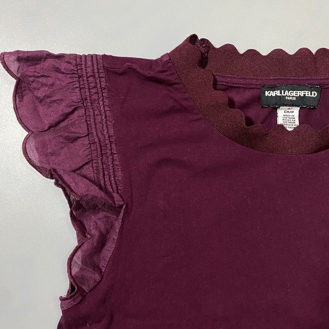 Karl Lagerfeld Flutter Sleeve Shirt (Category: Shirts) located in Manila. Submitted by curatedvg. (Listing ID 1468869107, Image 2). Description: Karl Lagerfeld Sleeveless Blouse Width: 17 inches Length: 23.5 inches Size S / Small Very good condition No major flaws Color: Burgundy / Maroon Accepting offers..