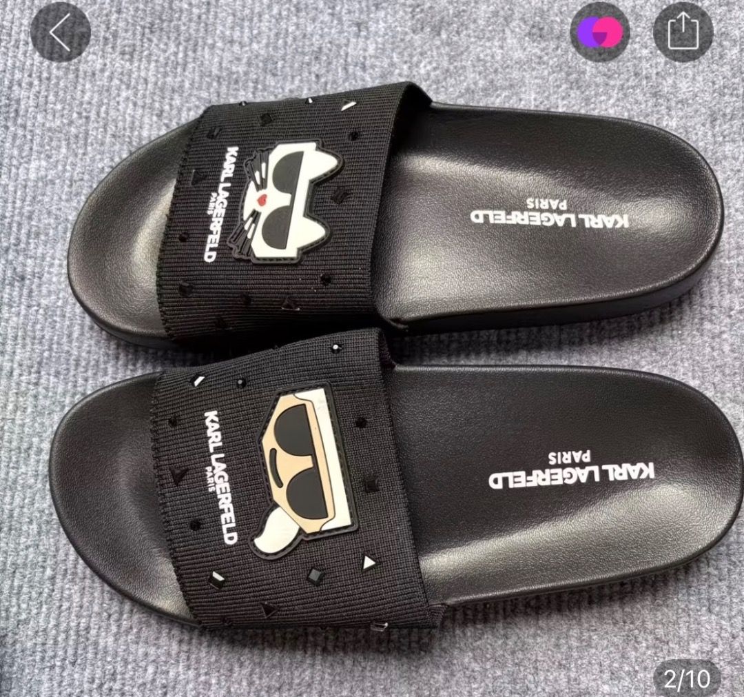 Karl Lagerfeld Paris Black Slides Sandals (Category: Flats & Sandals) located in Pasay City. Submitted by kgemsluxuryboutique (Listing ID 1468718681, Image 2). Description: - 100% Authentic Karl Lagerfeld Paris slides - Multiple stylish designs available: textured fabric, metallic accents, & classic logo prints - Super comfortable contoured footbed for all-day wear - Textured outsole provides reliable grip and anti-slip traction - Easy slip-on st