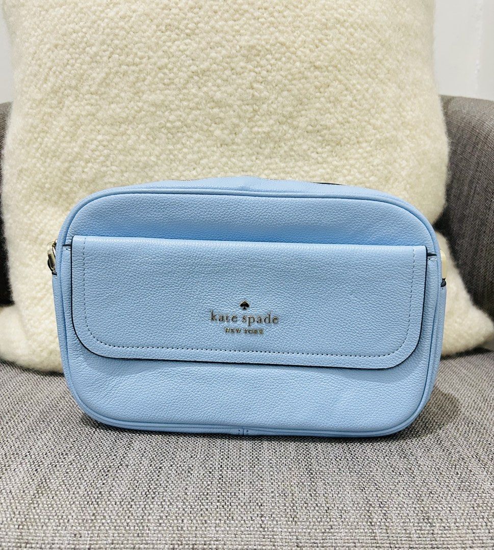 Kate Spade Camera Bag (Category: Cross-body Bags) located in Pasay City. Submitted by greenberry08 (Listing ID 1468923731, Image 1). Description: - Brand: Kate Spade New York - Material: Premium light blue pebbled leather - Closure: Smooth-zipping main compartment - Exterior: Front pocket with flap closure and metal logo lettering - Size: Compact and lightweight, ideal for daily essentials - Condition: Clean texture and excellent working zipper.