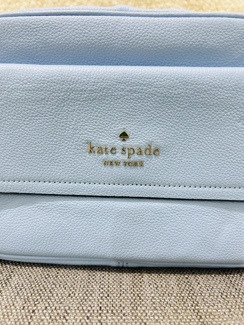 Kate Spade Camera Bag (Category: Cross-body Bags) located in Pasay City. Submitted by greenberry08 (Listing ID 1468923731, Image 2). Description: - Brand: Kate Spade New York - Material: Premium light blue pebbled leather - Closure: Smooth-zipping main compartment - Exterior: Front pocket with flap closure and metal logo lettering - Size: Compact and lightweight, ideal for daily essentials - Condition: Clean texture and excellent working zipper.