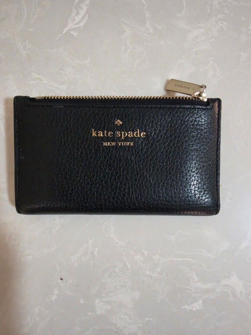 Kate Spade Card Holder Slim Bifold Wallet (Category: Wallets & Card holders) located in Binan City. Submitted by thelleshop (Listing ID 1468783887, Image 2). Description: SALE!! In very excellent condition Actual pics posted Description also uploaded for reference Strictly no returns once shipped Thank you!.