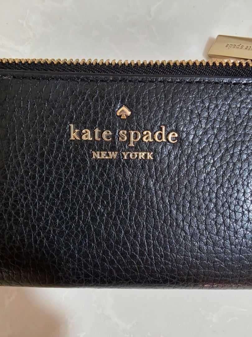 Kate Spade Card Holder Slim Bifold Wallet (Category: Wallets & Card holders) located in Binan City. Submitted by thelleshop (Listing ID 1468783887, Image 3). Description: SALE!! In very excellent condition Actual pics posted Description also uploaded for reference Strictly no returns once shipped Thank you!.