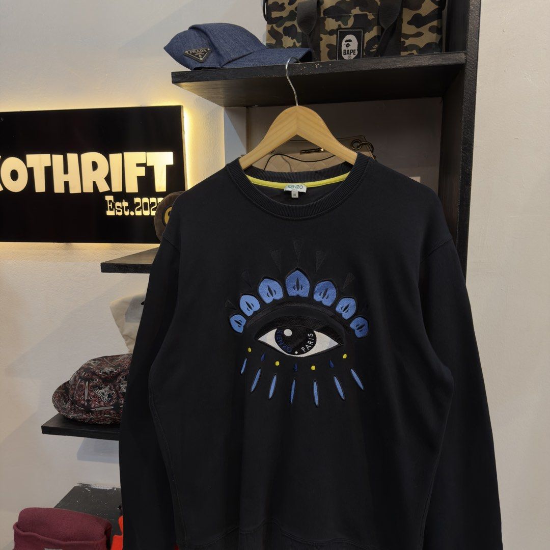 Kenzo Eye Embroidered Logo Sweatshirt (Category: Coats, Jackets and Outerwear) located in Manila. Submitted by jerichomal82553 (Listing ID 1468911030, Image 2). Description: Kenzo Eye Embroidered Logo Sweatshirt 23.5 by 28 Good Condition Complete Tags .