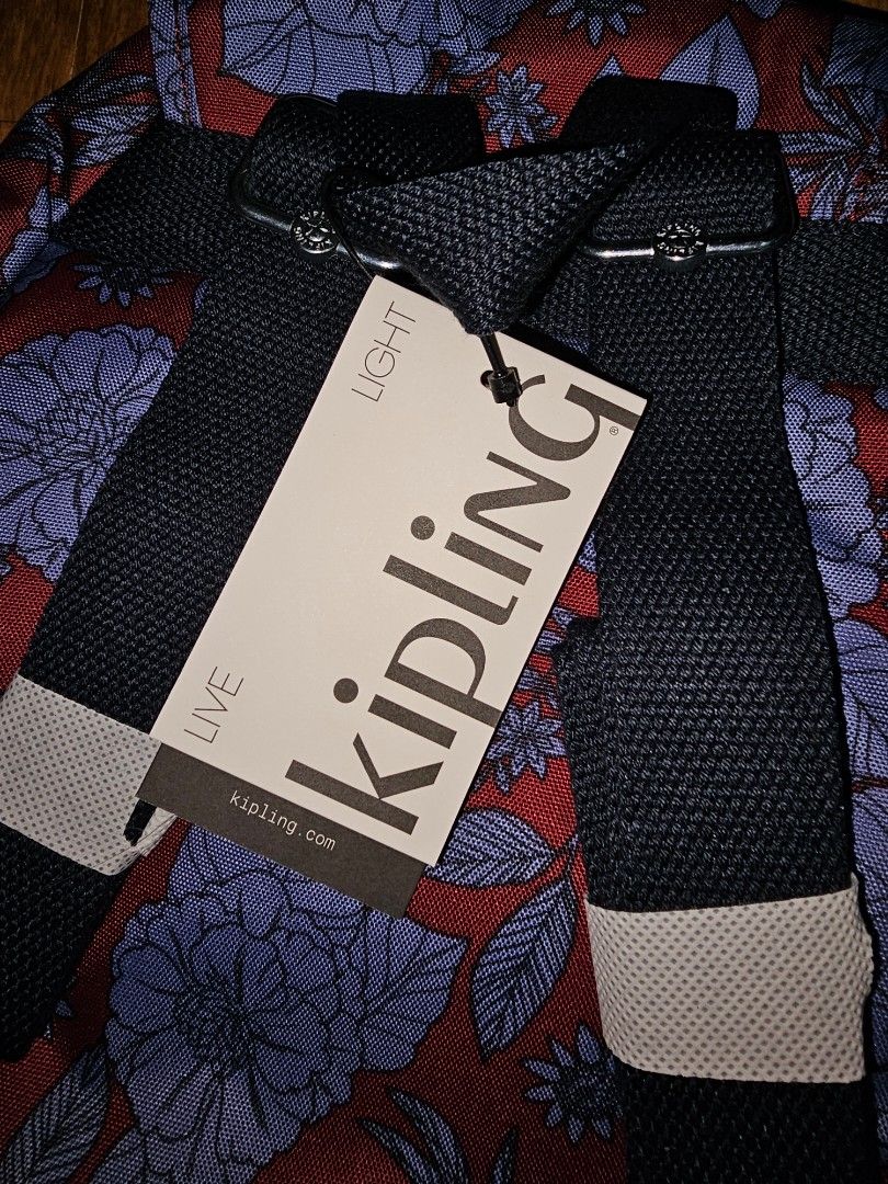 Kipling Ezra S Backpack Gothic Rose Floral (Category: Backpacks) located in Quezon City. Submitted by findsbydavie (Listing ID 1468821965, Image 2). Description: COMES WITH ORIGINAL PLASTIC BAG Negotiable price - Brand: Kipling Ezra S Backpack - Color/Pattern: Gothic Rose (Red fabric with blue flowers and leaves) - Condition: Brand new with original store tag ($119 value) - Style Number: KI2420 - Features: Dark adjustable straps and signature fur