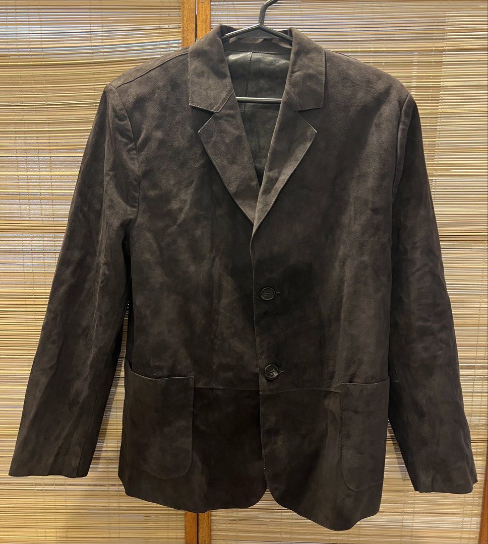 Kircilar Fume Suede Blazer Size 2 (Category: Coats, Jackets and Outerwear) located in Manila. Submitted by noblecrystal_ff870c (Listing ID 1468746184, Image 1). Description: - Brand: Kircilar - Style: Suede blazer (Model MW-4155) - Color: Fume - Size: 2 - Closure: Two-button front closure - Cuffs: Three buttons on each sleeve - Pockets: Two front patch pockets - Lining: Checkered pattern throughout the interior - Finish: Smooth leather finish ins