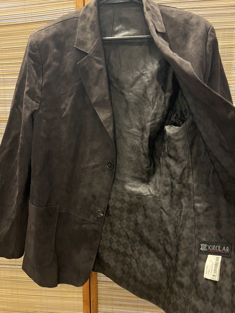 Kircilar Fume Suede Blazer Size 2 (Category: Coats, Jackets and Outerwear) located in Manila. Submitted by noblecrystal_ff870c (Listing ID 1468746184, Image 3). Description: - Brand: Kircilar - Style: Suede blazer (Model MW-4155) - Color: Fume - Size: 2 - Closure: Two-button front closure - Cuffs: Three buttons on each sleeve - Pockets: Two front patch pockets - Lining: Checkered pattern throughout the interior - Finish: Smooth leather finish ins