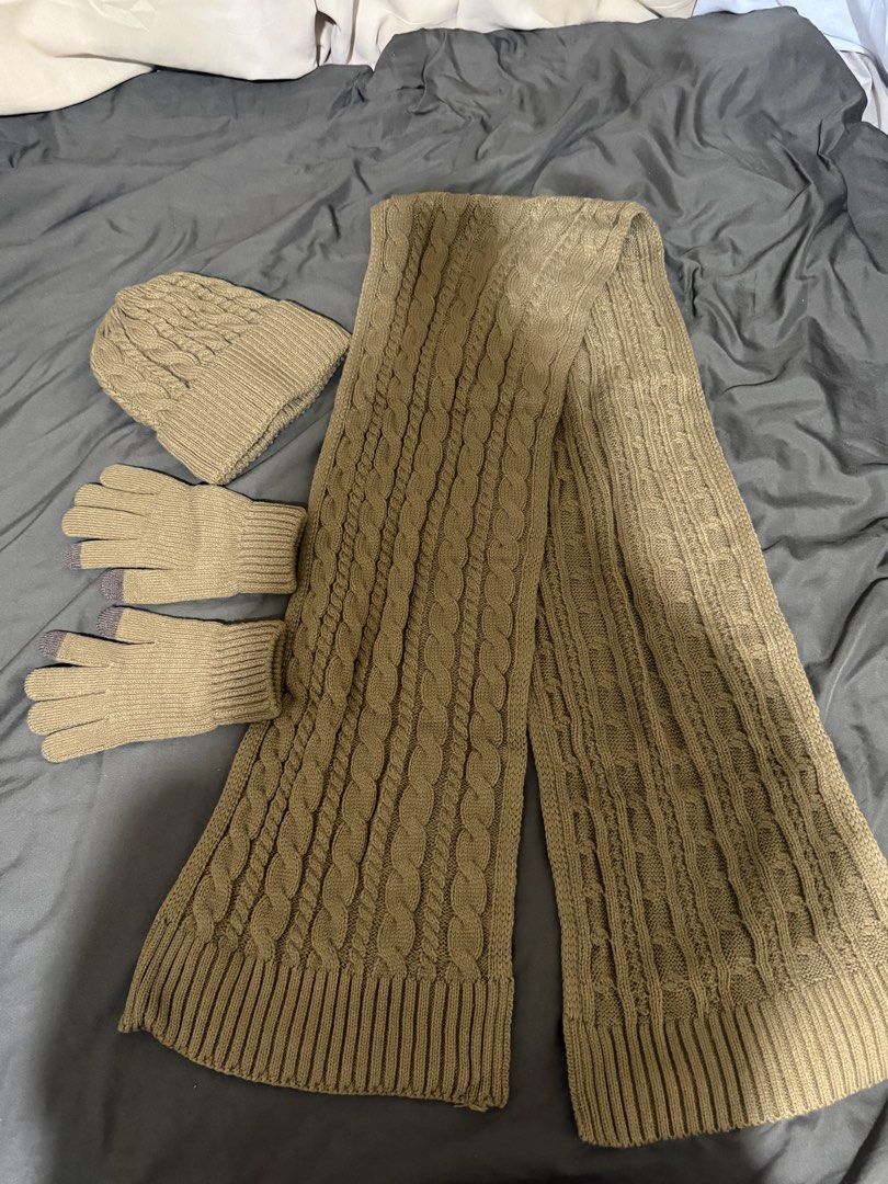 Knit Winter Set Beanie Scarf Touchscreen Gloves Camel (Category: Coats, Jackets and Outerwear) located in Quezon City. Submitted by turtleandfishes (Listing ID 1468720802, Image 2). Description: - 3-piece winter set in a versatile camel brown shade - Includes a chunky cable knit beanie for warmth - Long matching scarf to wrap up comfortably - Touchscreen-compatible gloves with convenient grey fingertips - Perfect for cold weather trips and easily