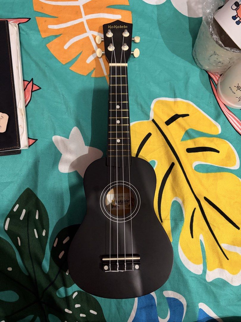 KOKOLELE Black Ukulele (Category: Musical Instruments) located in Quezon City. Submitted by declutterwithnari (Listing ID 1468719983, Image 1). Description: KOKOLELE Black Ukulele - with signs of usage, can request for pictures when you’re a sure buyer! :) no problem with the actual ukulele though - includes a small bag 🤍 one of my favorites but must let go mop: GCash, GoTyme, Maya (payment first) mod: Lalamove, Grab .