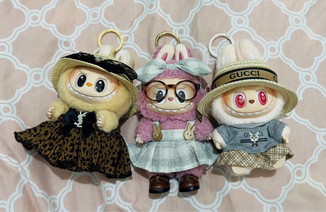 Labubu Plush Pendants with Outfits (Lychee Berry, Dada, & Baba) (Category: Plushies & Soft Toys) located in Pasay City. Submitted by aubreeeeyy (Listing ID 1468771473, Image 2). Description: - Set of 3 Labubu plush figures - All three come with free outfits - Take all for PHP 2,000 - Clean condition, carefully displayed - No box - Guaranteed authentic.