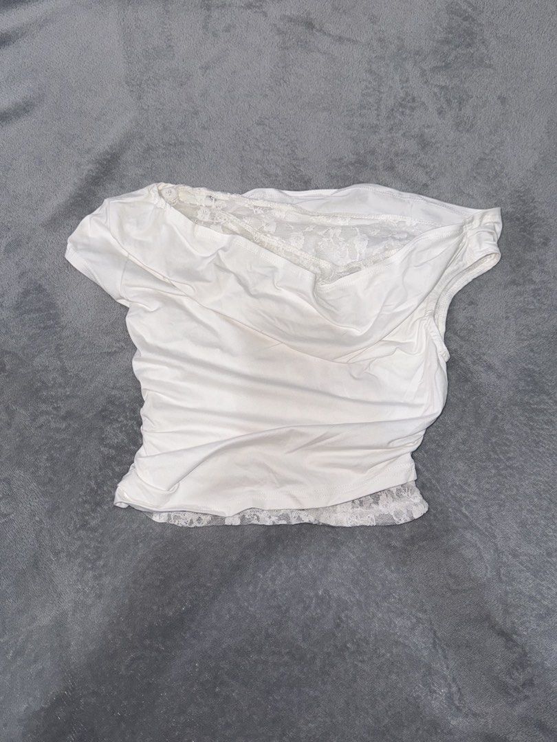 Lace Asymmetrical Shoulder White Top (Category: Shirts) located in Capas. Submitted by blesseee_d (Listing ID 1468749673, Image 1). Description: DM me! 💕.