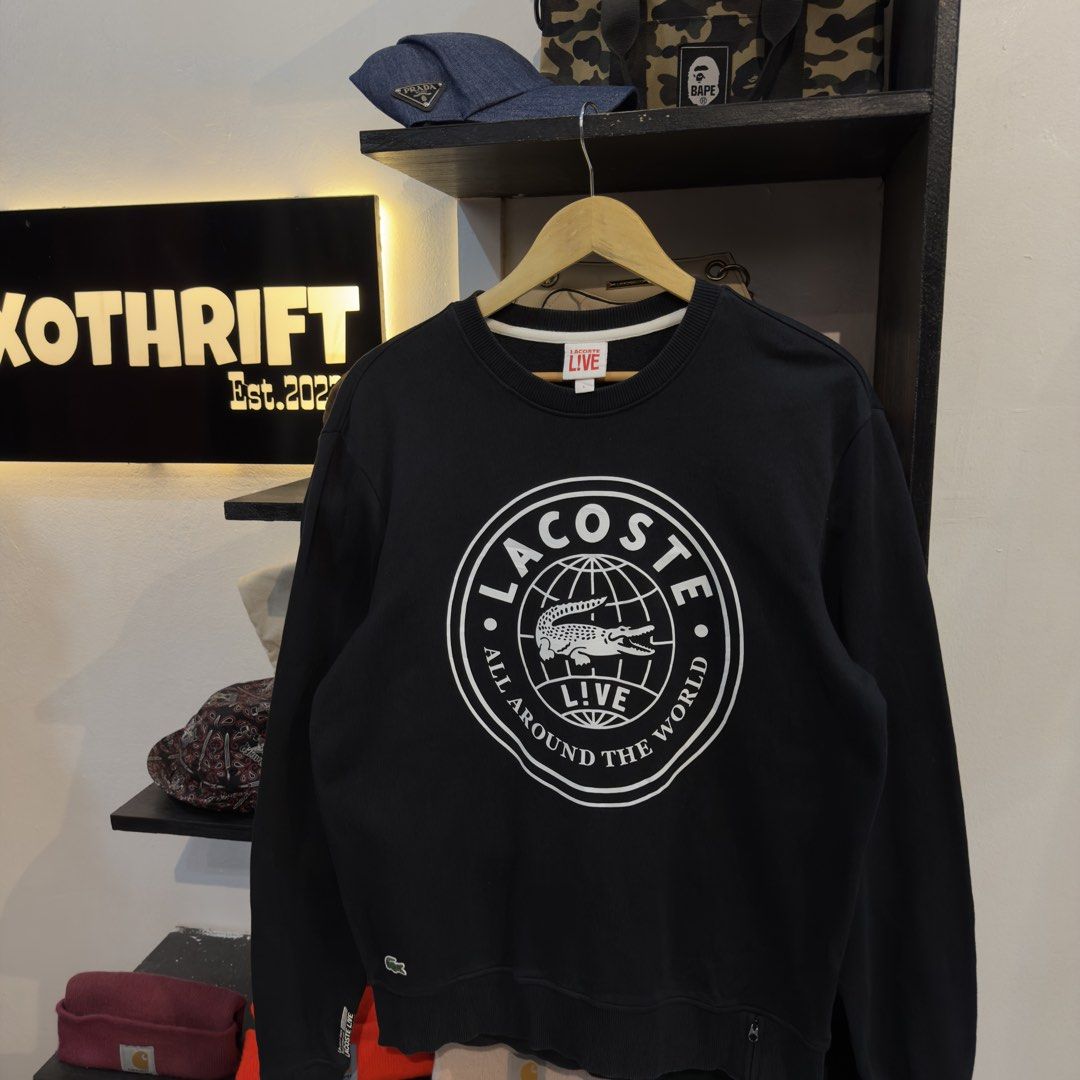 Lacoste Black Big Logo Sweatshirt (Category: Coats, Jackets and Outerwear) located in Manila. Submitted by jerichomal82553 (Listing ID 1468911553, Image 2). Description: Lacoste Black Big Logo Sweatshirt 22.5 by 27 Good Condition Complete Tags .