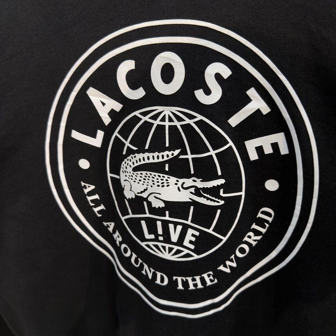 Lacoste Black Big Logo Sweatshirt (Category: Coats, Jackets and Outerwear) located in Manila. Submitted by jerichomal82553 (Listing ID 1468911553, Image 3). Description: Lacoste Black Big Logo Sweatshirt 22.5 by 27 Good Condition Complete Tags .