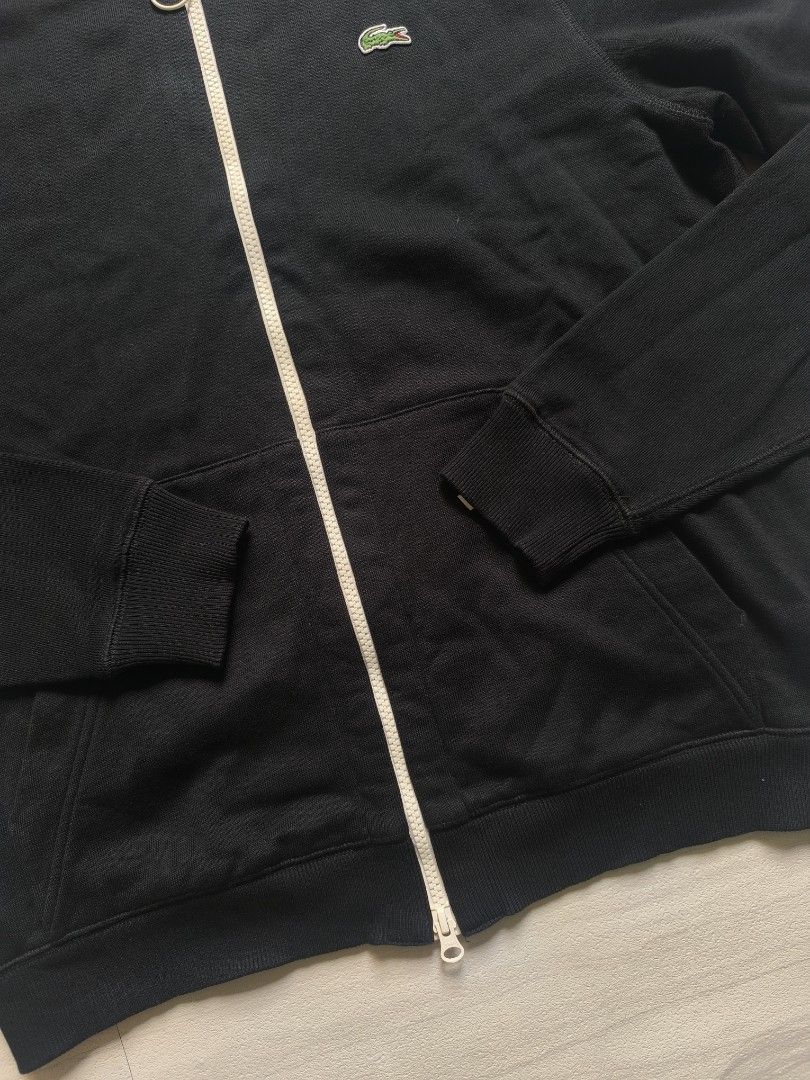 Lacoste L!VE Black Zip-Up Jacket (Category: Coats, Jackets and Outerwear) located in Talisay. Submitted by jppppppppp (Listing ID 1468793274, Image 3). Description: Lacoste Live Varsity Jacket Cotton Tagged as Size 5 /Large Actual Dimensions 22*27 Shoulder 18" Sleeve Length 26.5 Excellent Condition 2️⃣3️⃣9️⃣0️⃣+SF 09472849954.