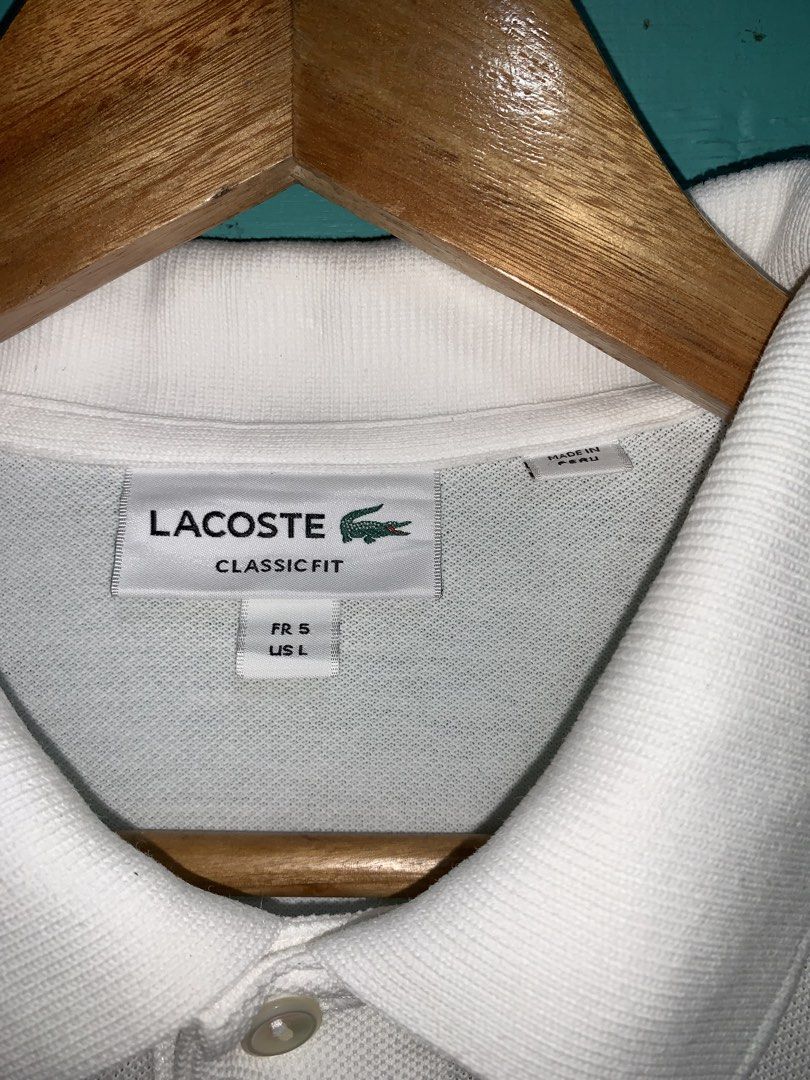 Lacoste polo men (Category: Activewear) located in Cebu City. Submitted by head.ace1993 (Listing ID 1468782474, Image 2). Description: Size 5 Dimes: 21x28.5 Excellent condition Color rate 10/10 No issue .