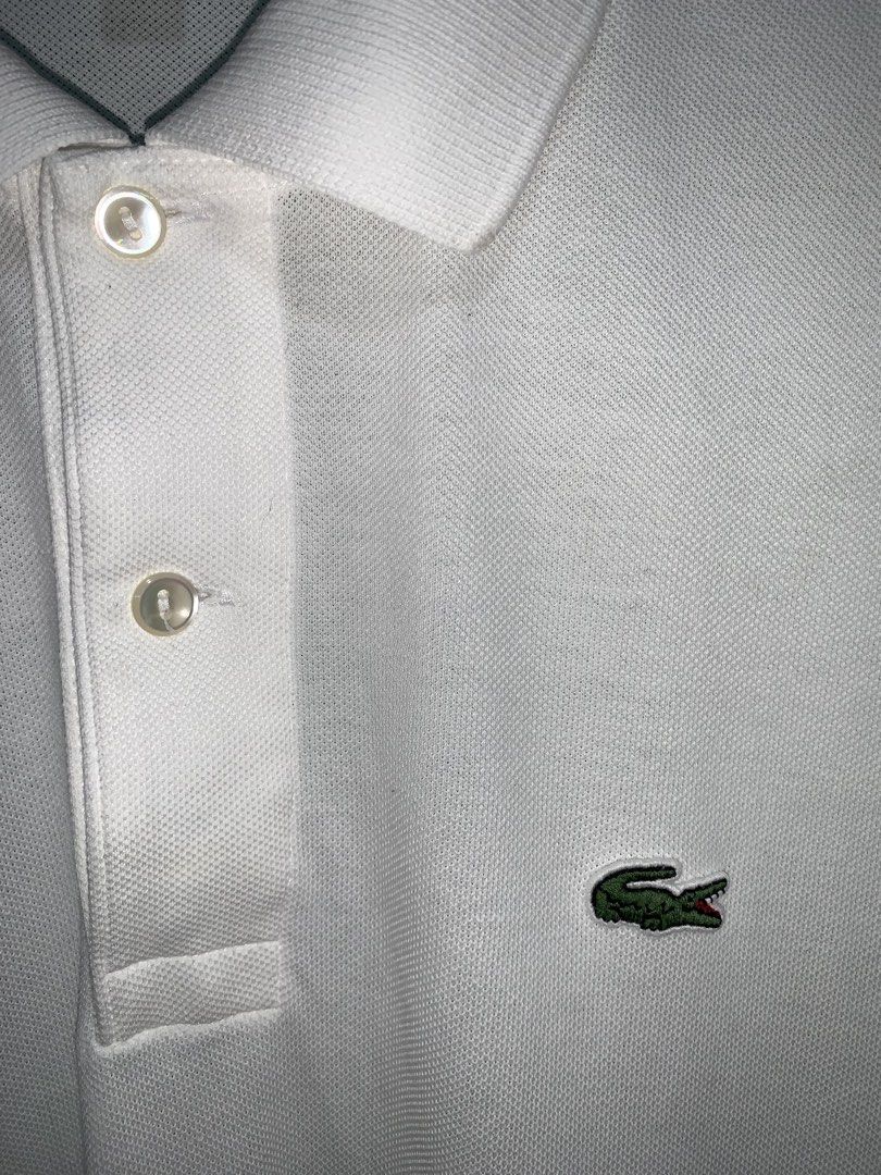 Lacoste polo men (Category: Activewear) located in Cebu City. Submitted by head.ace1993 (Listing ID 1468782474, Image 3). Description: Size 5 Dimes: 21x28.5 Excellent condition Color rate 10/10 No issue .
