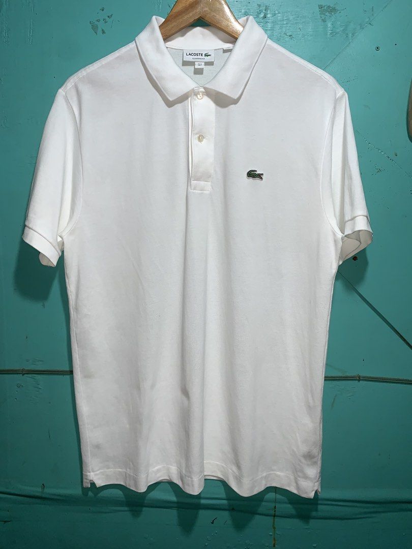 Lacoste polo men (Category: Activewear) located in Cebu City. Submitted by head.ace1993 (Listing ID 1468782474, Image 1). Description: Size 5 Dimes: 21x28.5 Excellent condition Color rate 10/10 No issue .