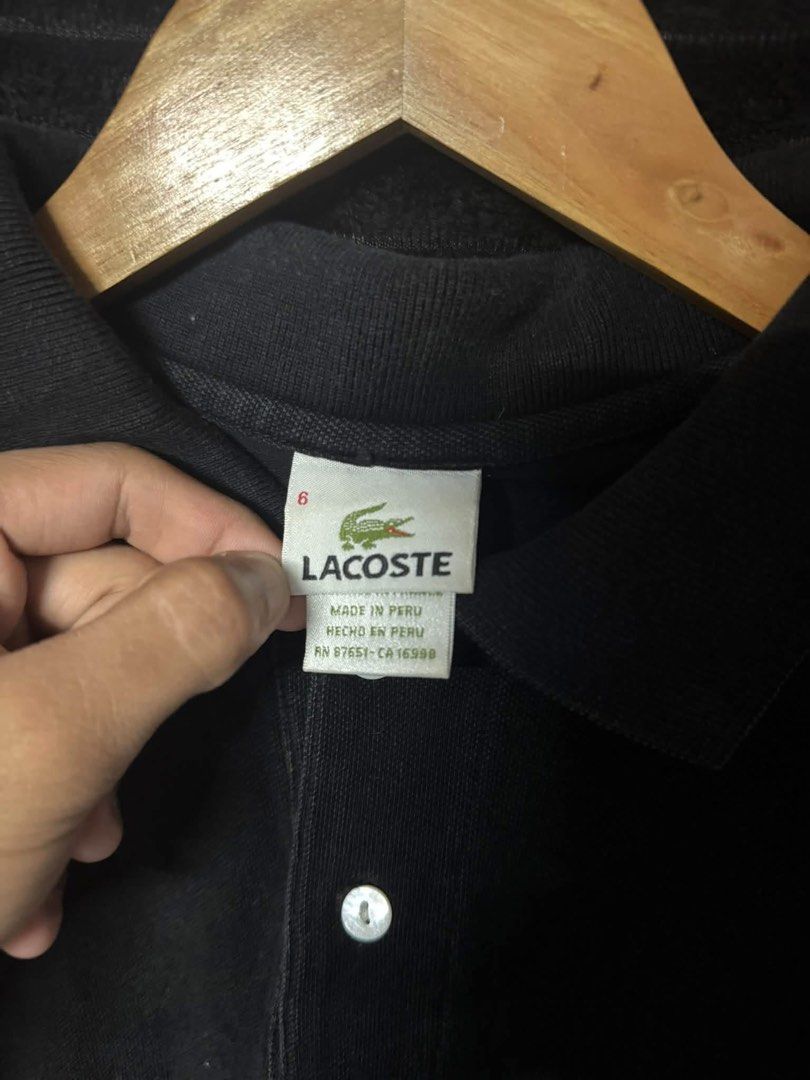 Lacoste Polo Shirt (Category: Tshirts & Polo Shirts ) located in Taguig. Submitted by thriftboy23 (Listing ID 1468753854, Image 3). Description: Lacoste Excellent condition No flaws Color rate: 9.5/10 Width: 20 Length: 26 ₱450 plus sf Location: Pinagsama Taguig.
