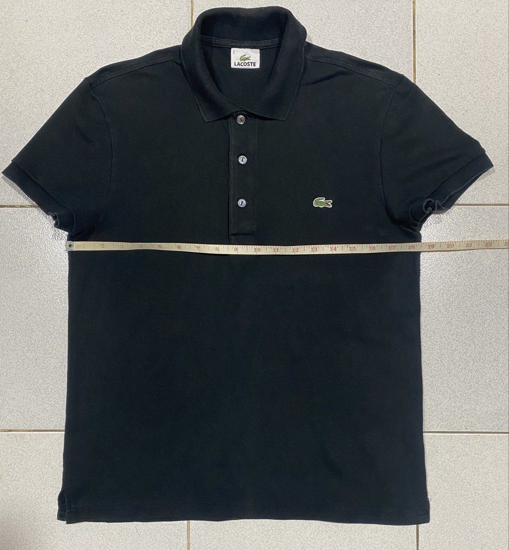 Lacoste Poloshirt (Category: Tshirts & Polo Shirts ) located in Mandaue City. Submitted by MJ_80 (Listing ID 1468854171, Image 3). Description: Mens Lacoste Black Poloshirt Size 2 Dimes: 18.5 X 25 See photos for measurements Color rate & Condition: 9/10 Price: 780 .
