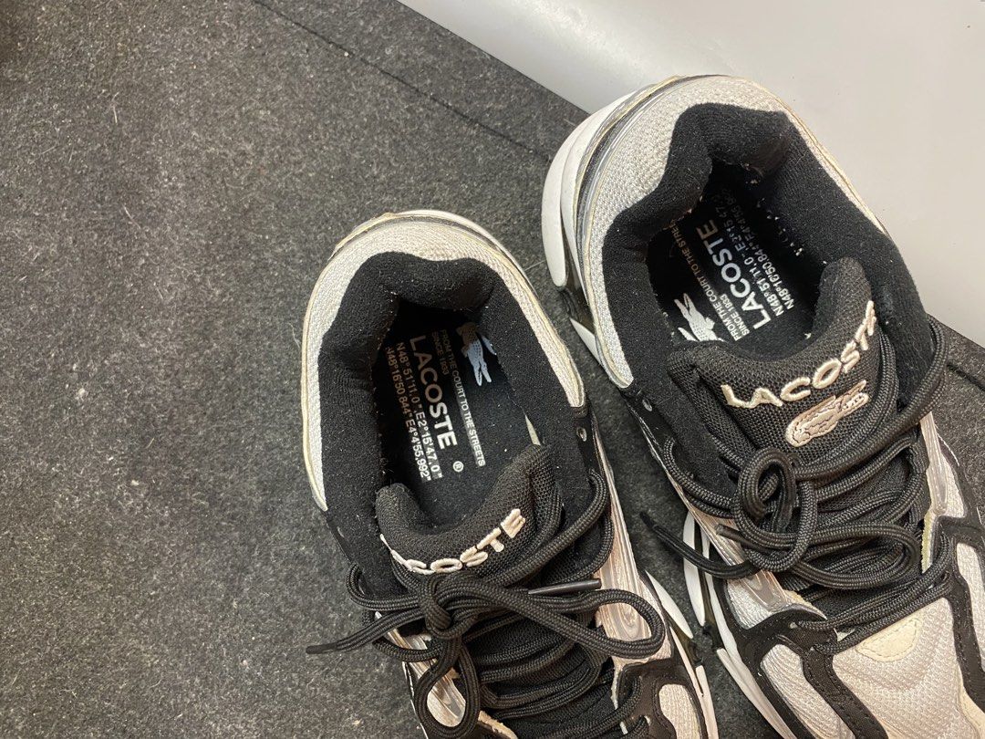 Lacoste Sneakers (Category: Sneakers) located in Quezon City. Submitted by loloyz123 (Listing ID 1468860909, Image 3). Description: Lacoste Sneakers Condition: Very good Color rate: 9.8/10 Color: Black Size: 7 insole: 26.5 cm.