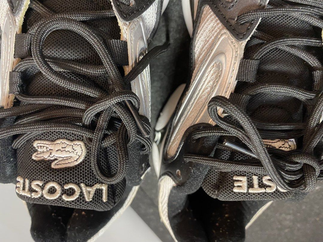 Lacoste Sneakers (Category: Sneakers) located in Quezon City. Submitted by loloyz123 (Listing ID 1468860909, Image 2). Description: Lacoste Sneakers Condition: Very good Color rate: 9.8/10 Color: Black Size: 7 insole: 26.5 cm.