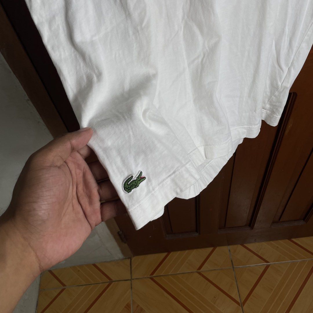 Lacoste spell out floral tee (Category: Activewear) located in Urdaneta. Submitted by northdrops_asian (Listing ID 1468885846, Image 2). Description: Excellent condition .