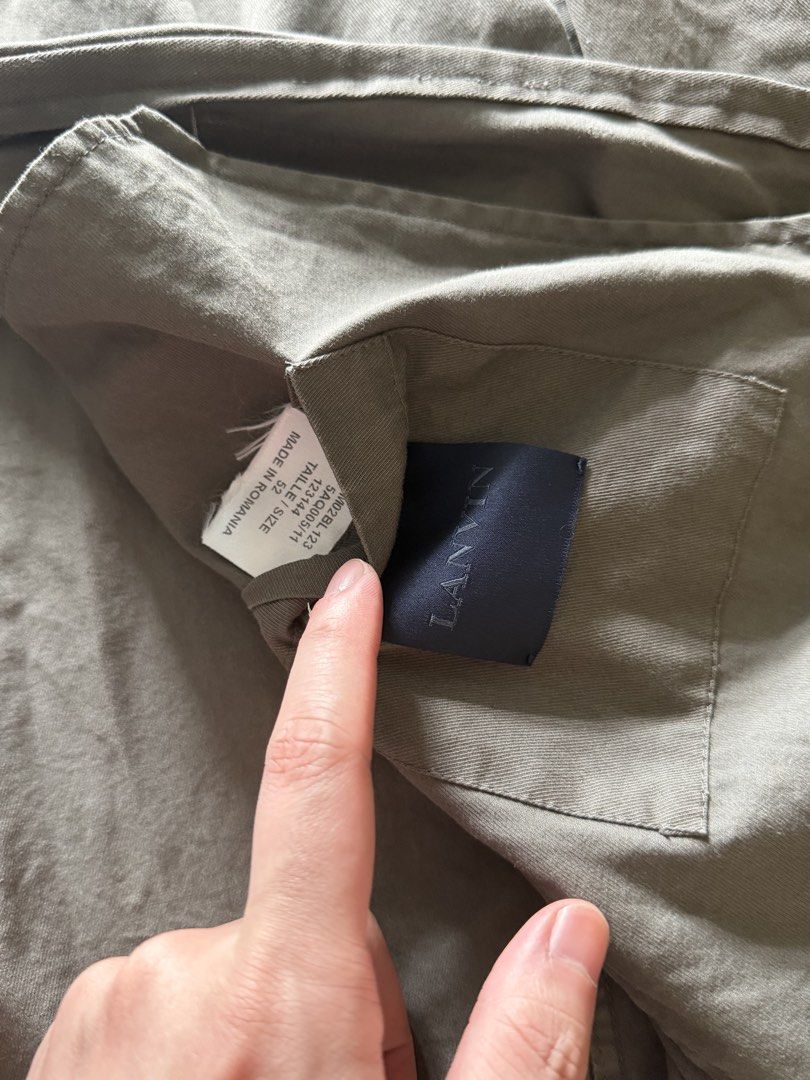Lanvin Olive Green Zip Jacket (Category: Coats, Jackets and Outerwear) located in Makati City. Submitted by size9pls (Listing ID 1468775972, Image 3). Description: - Brand: Lanvin - Color: Olive Green - Size: 52 (Made in Romania) - Design: Stand collar with frayed edges and vintage distressing throughout - Closure: Full front zipper - Pockets: Secure zipped side pockets and convenient interior pockets - Condition: Excellent pre-owned condition wi