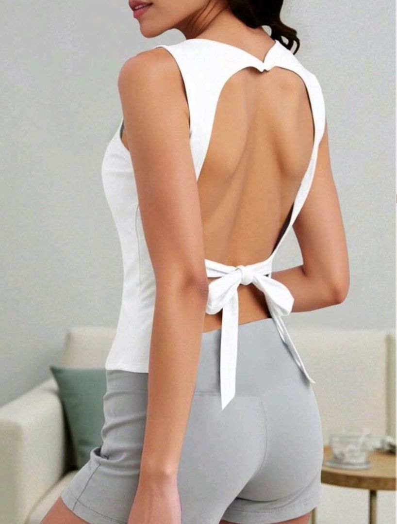 LARGE White Sexy Backless Top Blouse (Category: Sleeveless) located in Caloocan City. Submitted by ibado (Listing ID 1468788705, Image 2). Description: Bnew Please see picture for exact product measurment No when worn.