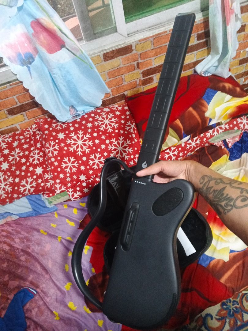 Lava genie (Category: Everything Else Others) located in Caloocan City. Submitted by are_u_dan (Listing ID 1468828649, Image 2). Description: Lava genie stringless smart guitar Good for beginners Complete with strap,bag,stickers,cord and box.