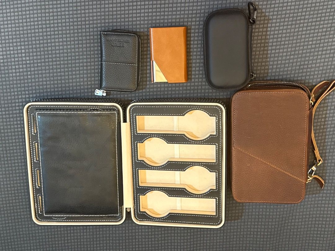 Leather Watch Case Storage Organizer with Small Pouches (Category: Accessory Holder, Box & Organizers) located in Taguig. Submitted by nday26 (Listing ID 1468857119, Image 1). Description: - Premium brown leather travel watch case - Securely holds up to 4 watches - Features extra small pouches and card holders for daily essentials - Reliable zip-around closure for maximum security - Compact design, easy to pack for trips or daily use - Brand new 