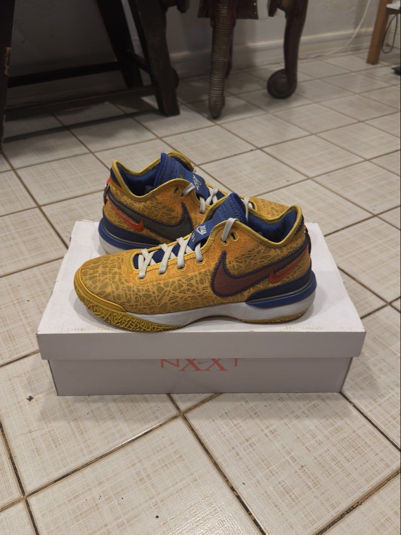 LeBron X Titan Collab (Category: Casual Shoes) located in Manila. Submitted by paposnkr (Listing ID 1468865572, Image 2). Description: Has minor flaws on the sides Comes with box and 2 extra laces.
