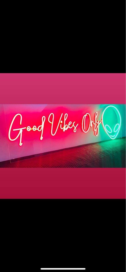LED Neon Sign (Category: Wall Decor) located in Manila. Submitted by missmix_08 (Listing ID 1468904188, Image 1). Description: - Design: 'Good Vibes Only' text with a green alien head outline - Glow: Vibrant red and green LED lights - Material: Mounted on a durable clear acrylic backing - Usage: Plug-and-play, ready to use out of the box - Perfect for: Bedroom decor, game rooms, and aesthetic wall lighting.