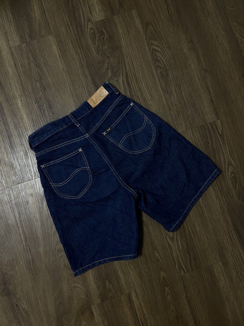 Lee Denim Shorts Size 25 (Category: Shorts) located in Davao. Submitted by znerol_26 (Listing ID 1468829268, Image 1). Description: - Brand: Lee - Style: Classic five-pocket denim shorts - Size: 25 (tag attached) - Color/Wash: Dark blue / dark indigo - Material: 99% cotton, 1% other fiber - Details: Contrast stitching, branded button closure, and leather patch on back waistband.