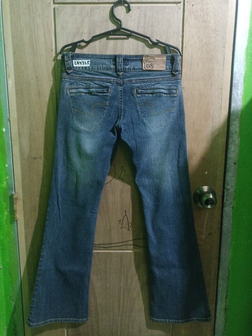 Lee Pipes 08 Denim Jeans flared (Category: Undergarments & Loungewear) located in Tarlac. Submitted by allinoneshop2178 (Listing ID 1468741205, Image 3). Description: - Brand/Model: Lee Pipes 08 bootcut jeans - Color/Wash: Classic blue wash with subtle fading - Waist: Mid-rise with button closure and belt loops - Pockets: Distinctive back pocket stitching with secure flap closures - Size: Tagged 27 x 35.5 - Condition: Great quality classic denim 