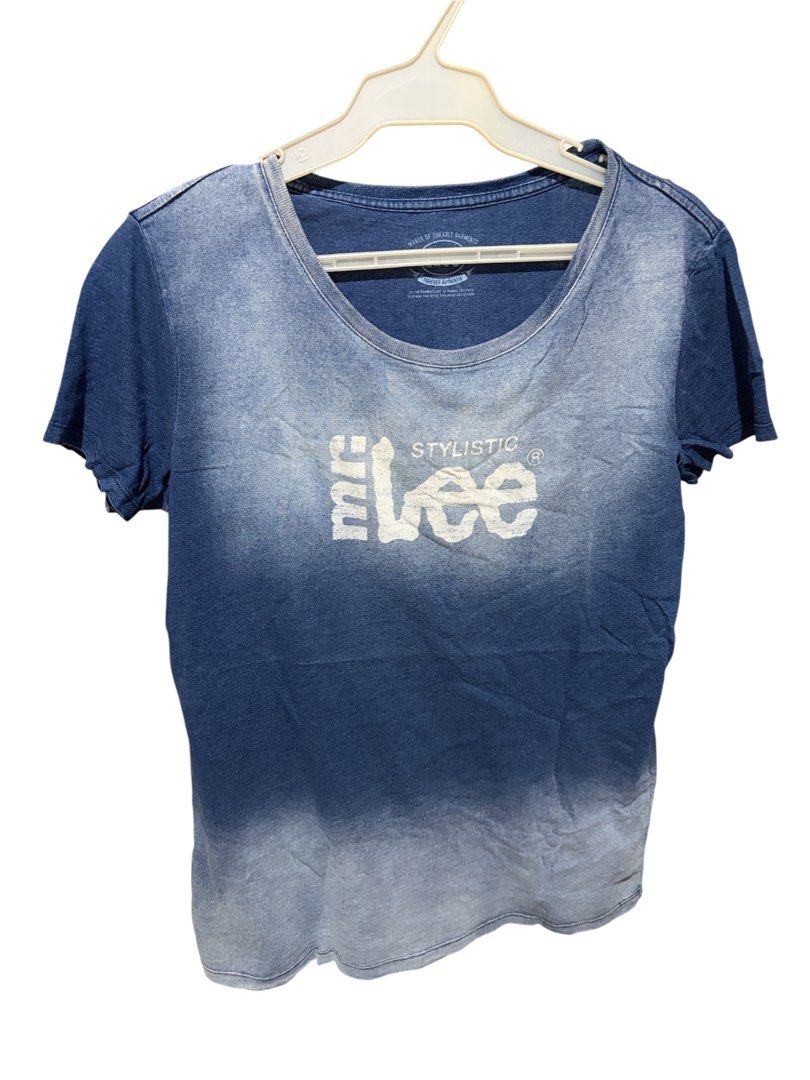 Lee Stylistic Blue Gradient T-Shirt Size L (Category: Tshirts & Polo Shirts ) located in Antipolo. Submitted by joyeduarte175 (Listing ID 1468863200, Image 1). Description: - Brand: Lee - Size: L (tag printed inside collar) - Color/Design: Blue with faded ombre gradient wash and large white chest logo - Style: Short sleeves, round neckline, classic vintage wash - Material: Soft and comfortable cotton - Condition: Excellent pre-loved/ready to wear