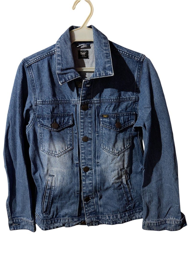 Lee Stylistic Denim Jacket Size S (Category: Coats, Jackets and Outerwear) located in Antipolo. Submitted by joyeduarte175 (Listing ID 1468823952, Image 1). Description: - Brand/Model: Lee Denim Jacket - Wash: Classic blue wash with heavy distressing and fading - Size: Small - Material: Sturdy cotton denim - Features: Button-up front, dual chest flap pockets, side welt pockets, and buttoned cuffs - Fit/Style: Great layering piece with a worn-in v