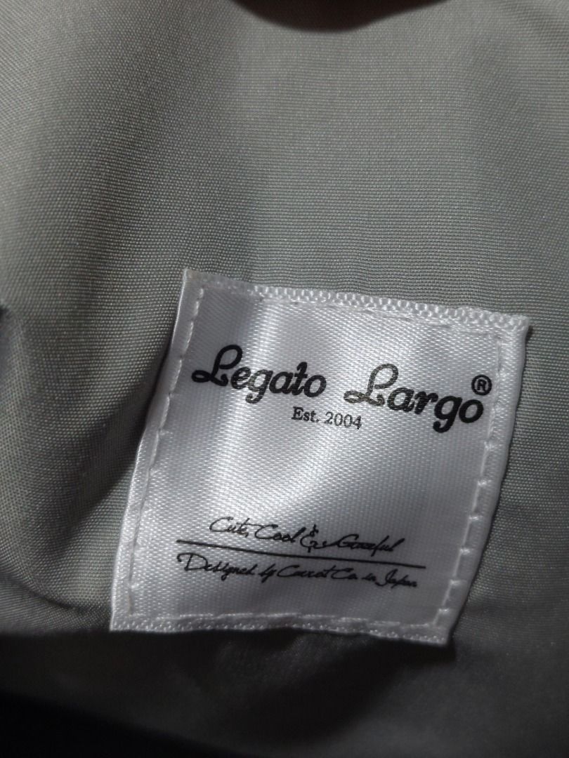 Legato Largo Blue Tote Bag with Strap (Category: Tote Bags) located in Las Pinas. Submitted by martinedee (Listing ID 1468776158, Image 2). Description: - Brand: Legato Largo (Carrot Company tag) - Material: Durable light blue nylon - Color: Light blue with brown handles and strap - Hardware: Gold-tone - Closure: Snap button - Strap: Matching adjustable crossbody strap - Interior: Grey lining with a convenient zipped divider pocket - Condition: C
