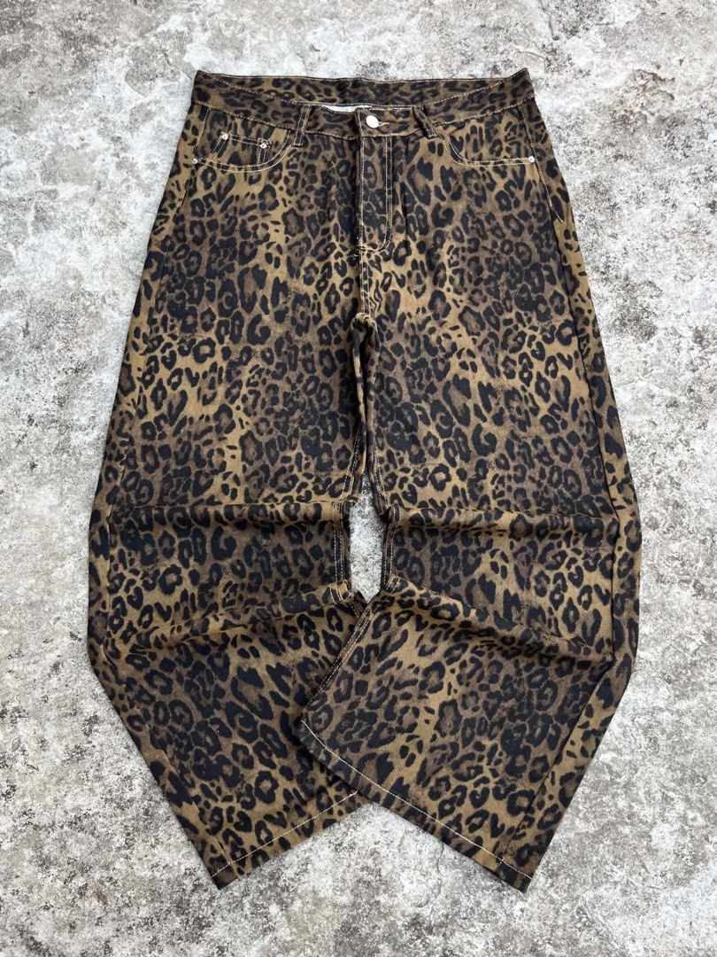 Leopard Print Denim Jeans Pants (Category: Jeans) located in Manila. Submitted by fiercefox.4ae806 (Listing ID 1468880985, Image 1). Description: - Bold all-over leopard print pattern - Classic straight leg cut - Standard button closure with belt loops - Functional front coin pockets and standard jean pocket layout - Perfect for making a stylish statement.